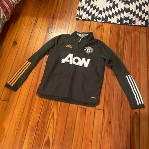 Manchester United three-quarter zip ￼ warm-up jacket